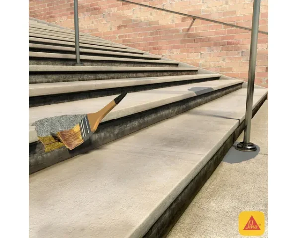 Detalle de unión estructural con Sikadur 32 Gel aplicada sobre hormigón, antes del vertido de concreto nuevo sobre encofrado y acero